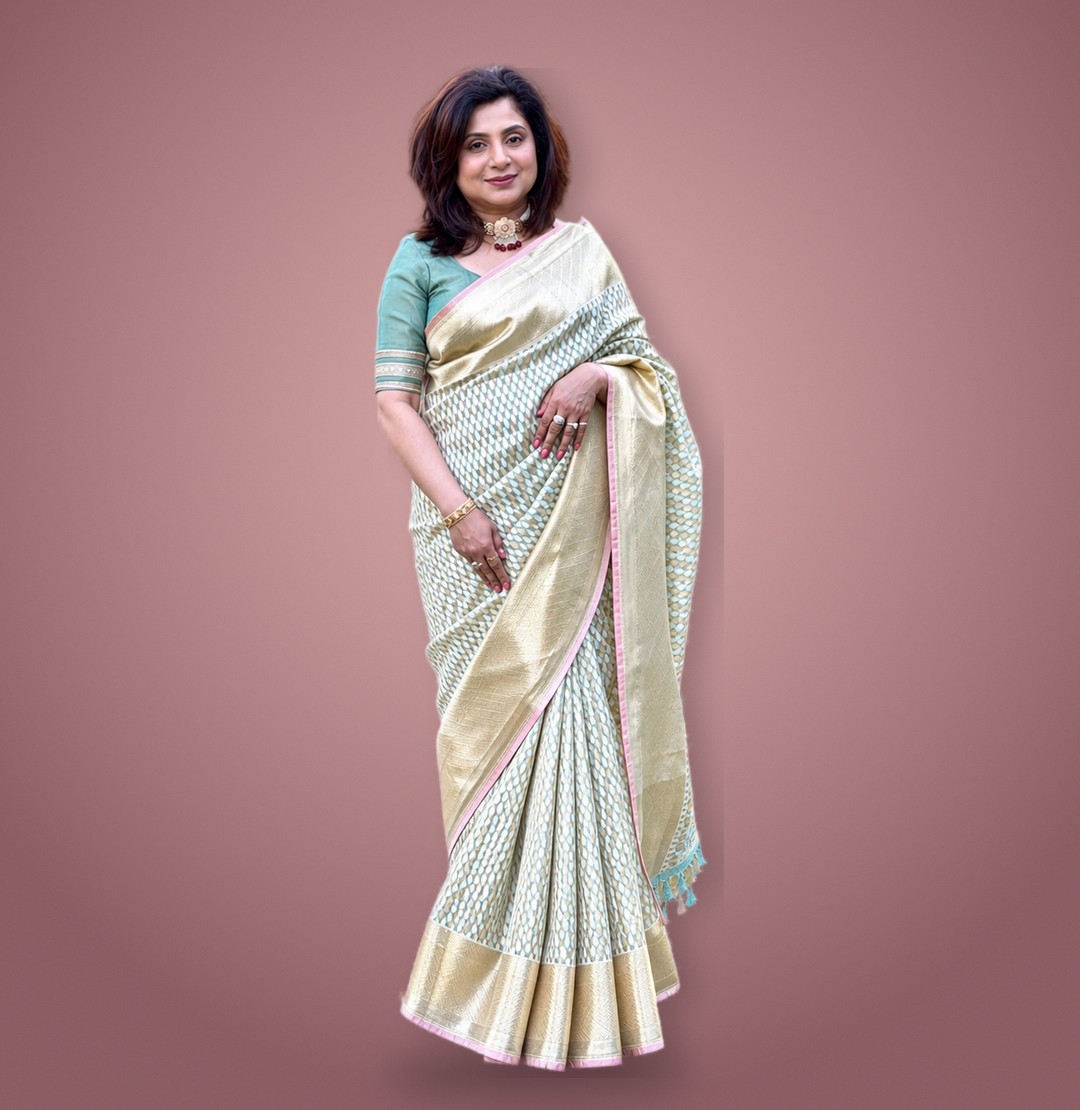 Sonali, founder of Ameyaa Collections, in a mint and gold Benarasi saree